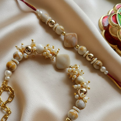 Elegant Pearl Bhai Bhabhi Rakhi Pair